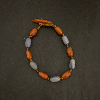 Bracelet en ivoire végétal marron et bleu Tagua & Co