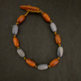 Bracelet en ivoire végétal marron et bleu Tagua & Co
