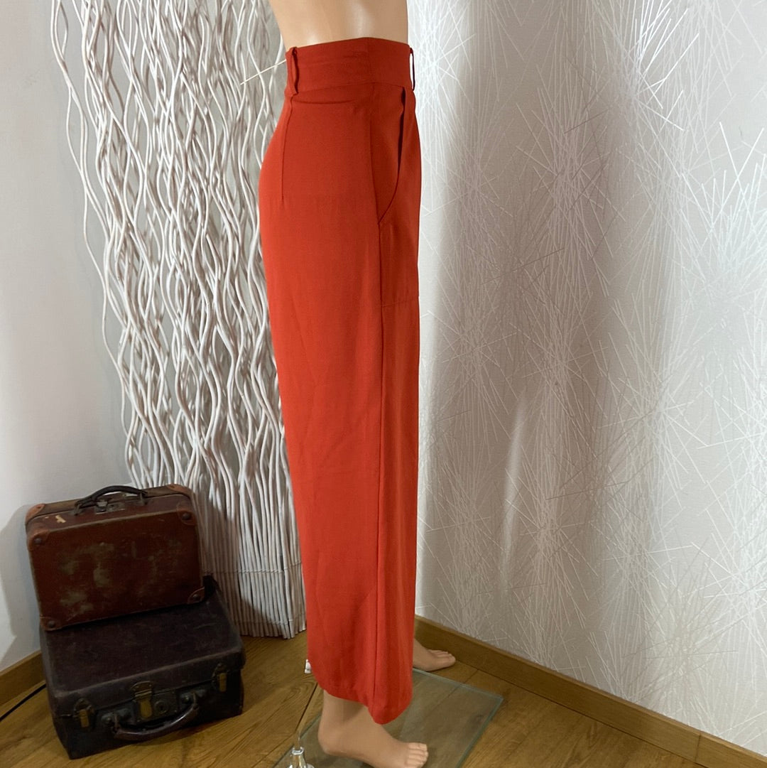 Pantalon fluide orange taille haute jambes larges Marfaa