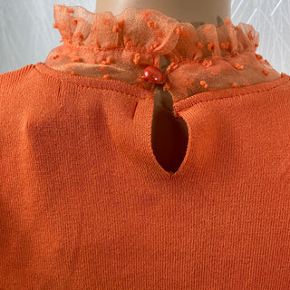 Pull orange manches transparentes broderie Papillonne