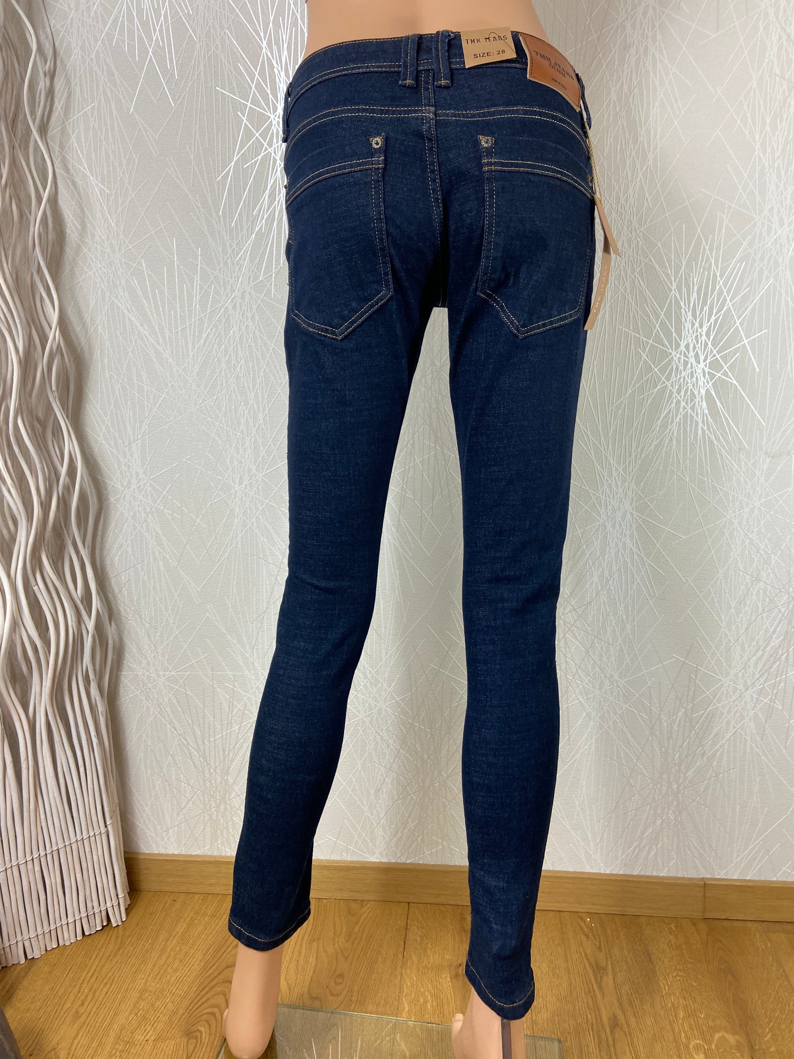 Jeans denim bleu brut taille moyenne coupe slim TMK