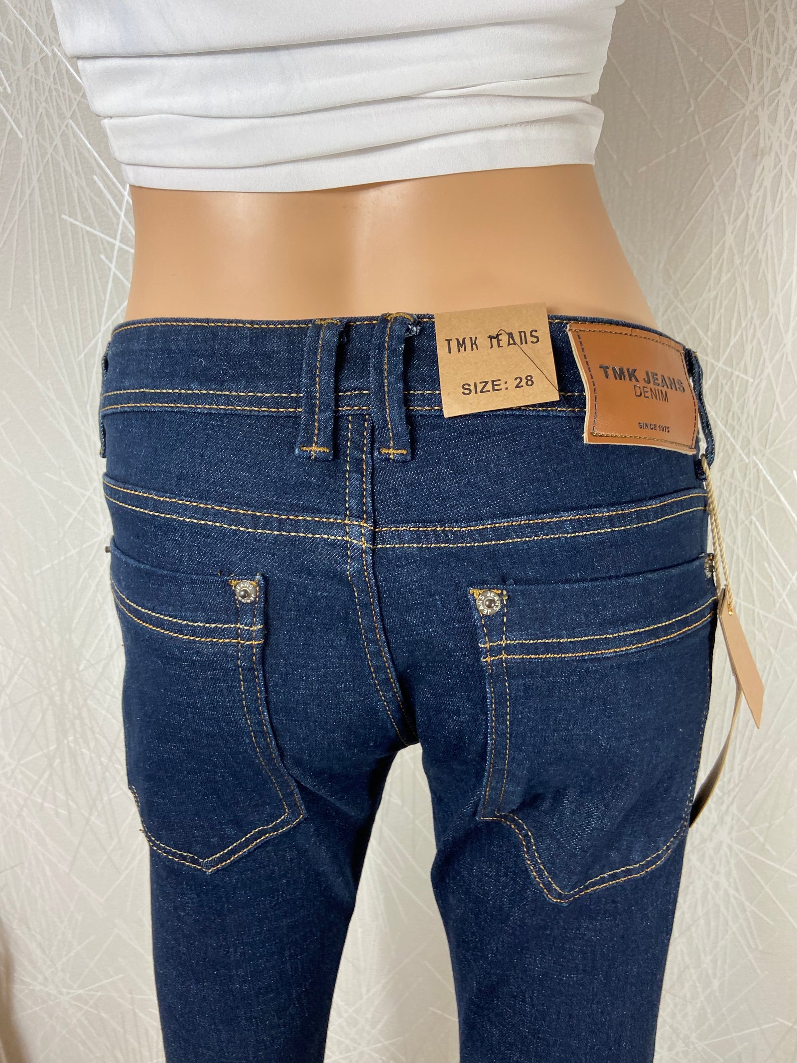 Jeans denim bleu brut taille moyenne coupe slim TMK