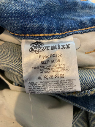 Pantacourt en coton denim jean delavé déchiré taille haute coupe mom Remixx Vintage