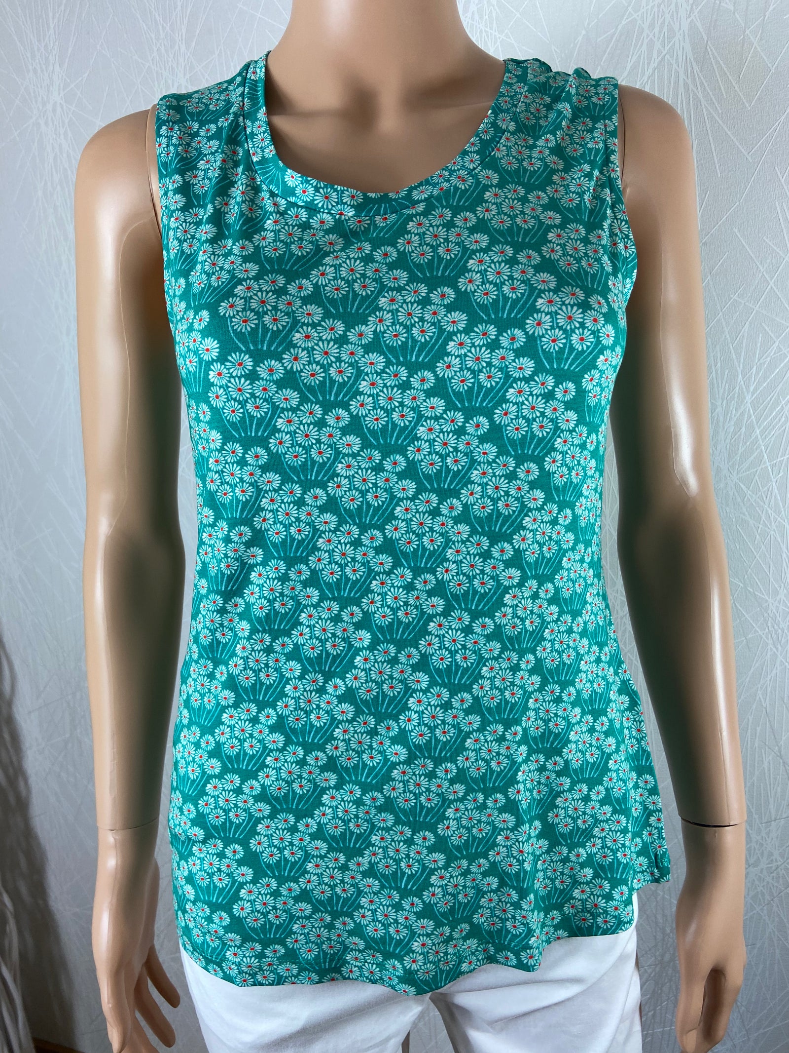 Top sans manches bleu turquoise motif vintage 60's Flower Field Whos That Girl - Offre-Unique