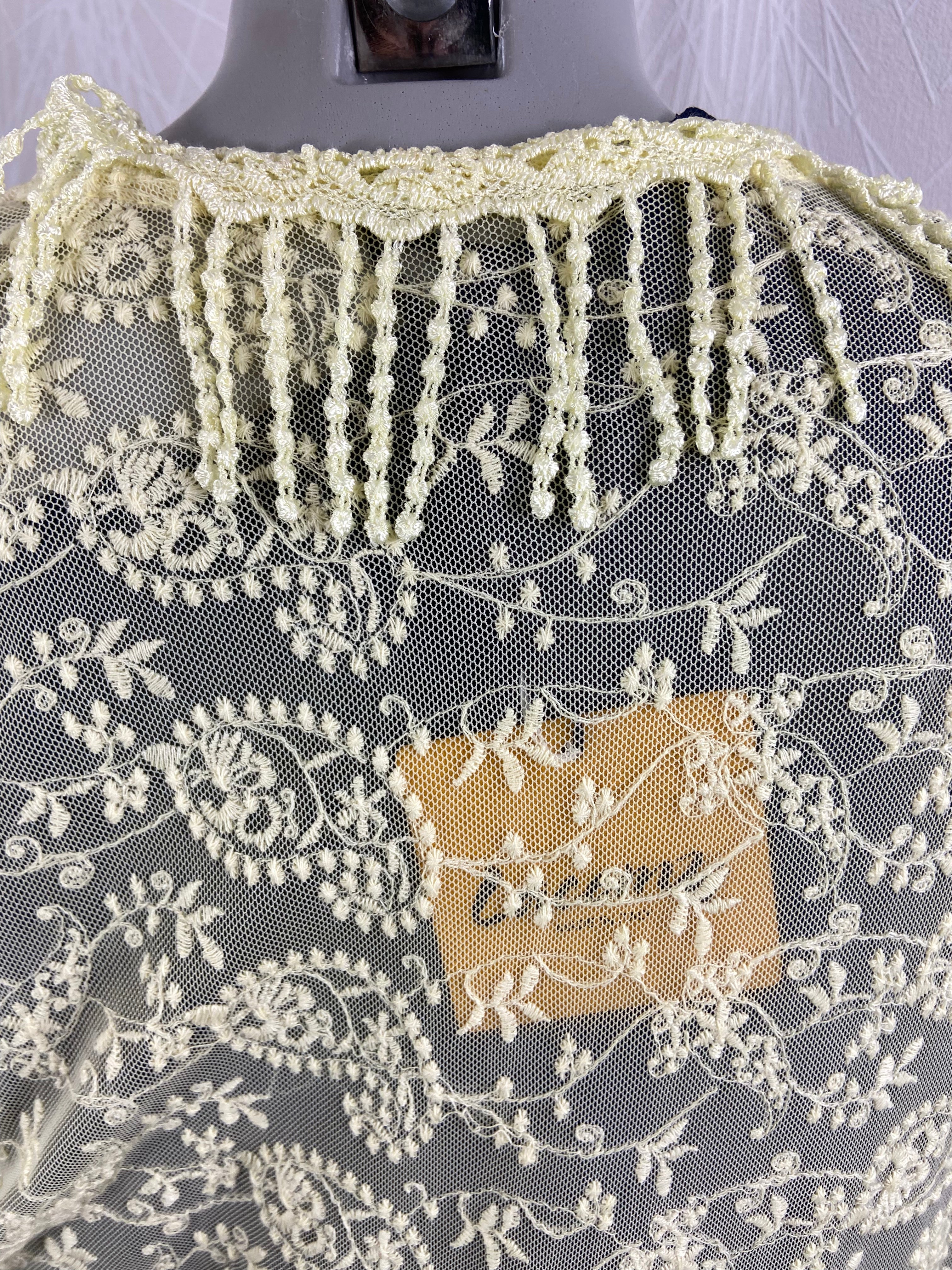 Gilet jaune long transparent dentelle franges Lacomy Taille