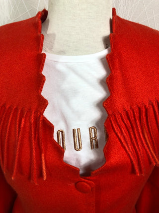 Veste longue orange à frange par le créateur Tabala Paris